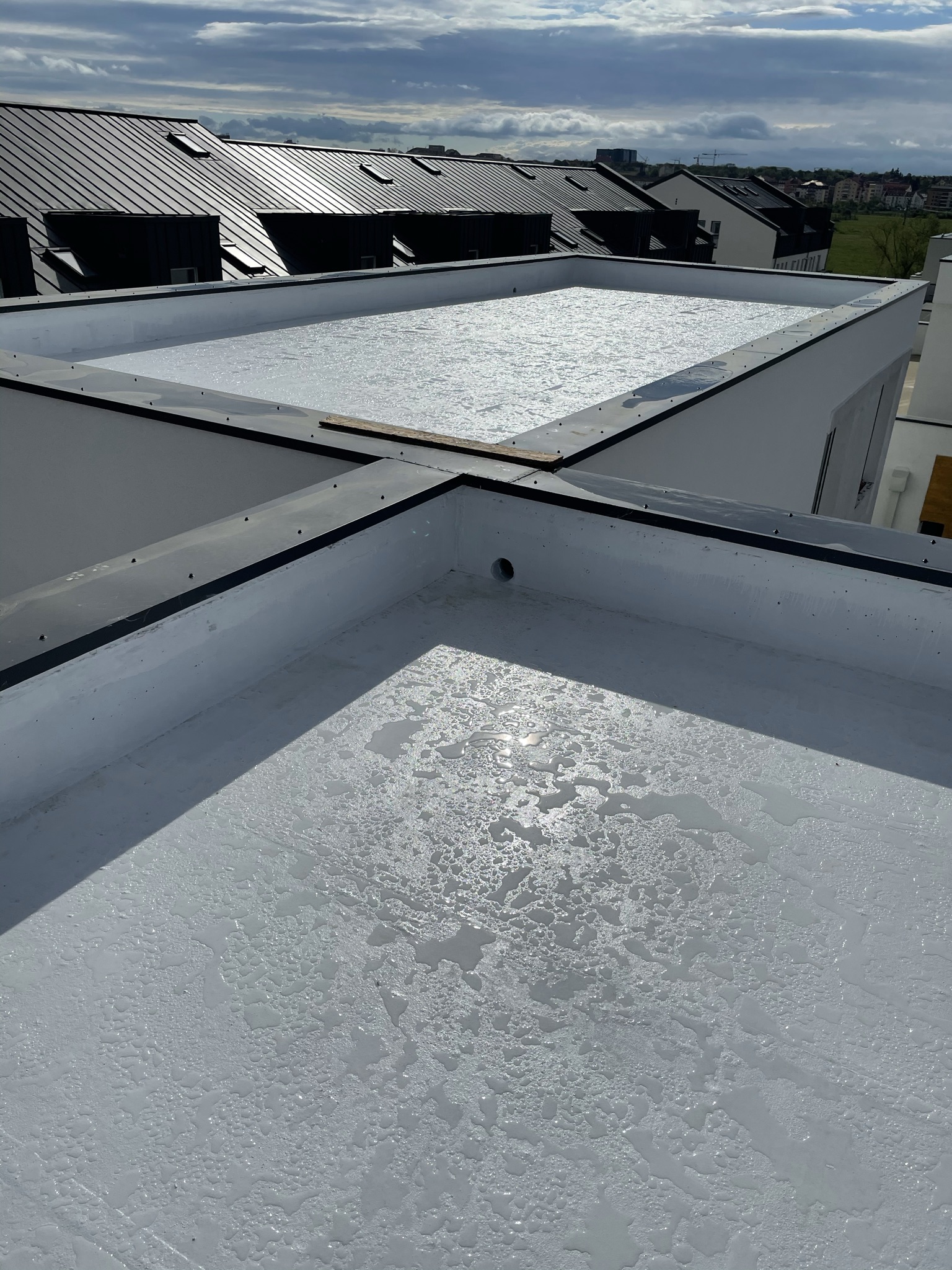 Roof with Maris Polymers products